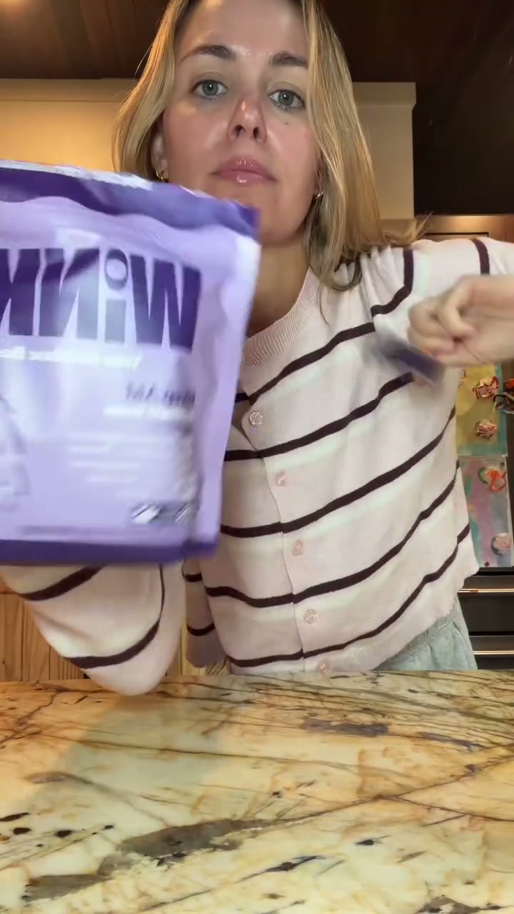 Lauren Sunday holding Winks in her creator video